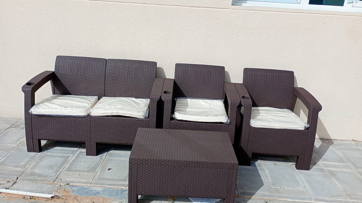 Customer photo: dark brown Havana 4-seater outdoor sofa set on a UAE patio