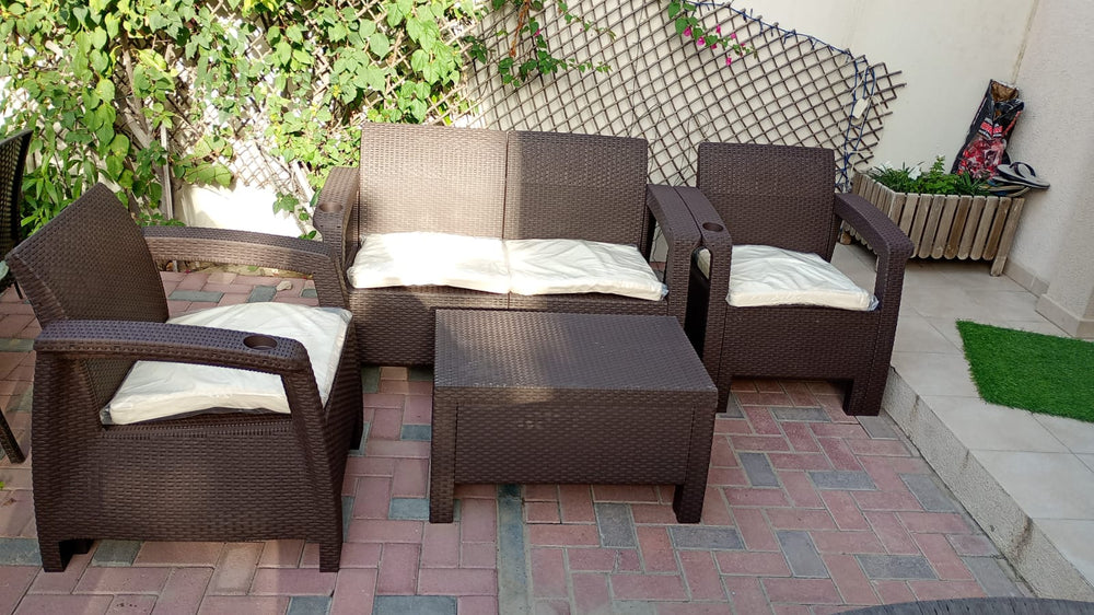 Customer photo: dark brown Havana 4-seater outdoor sofa set on a UAE terrace